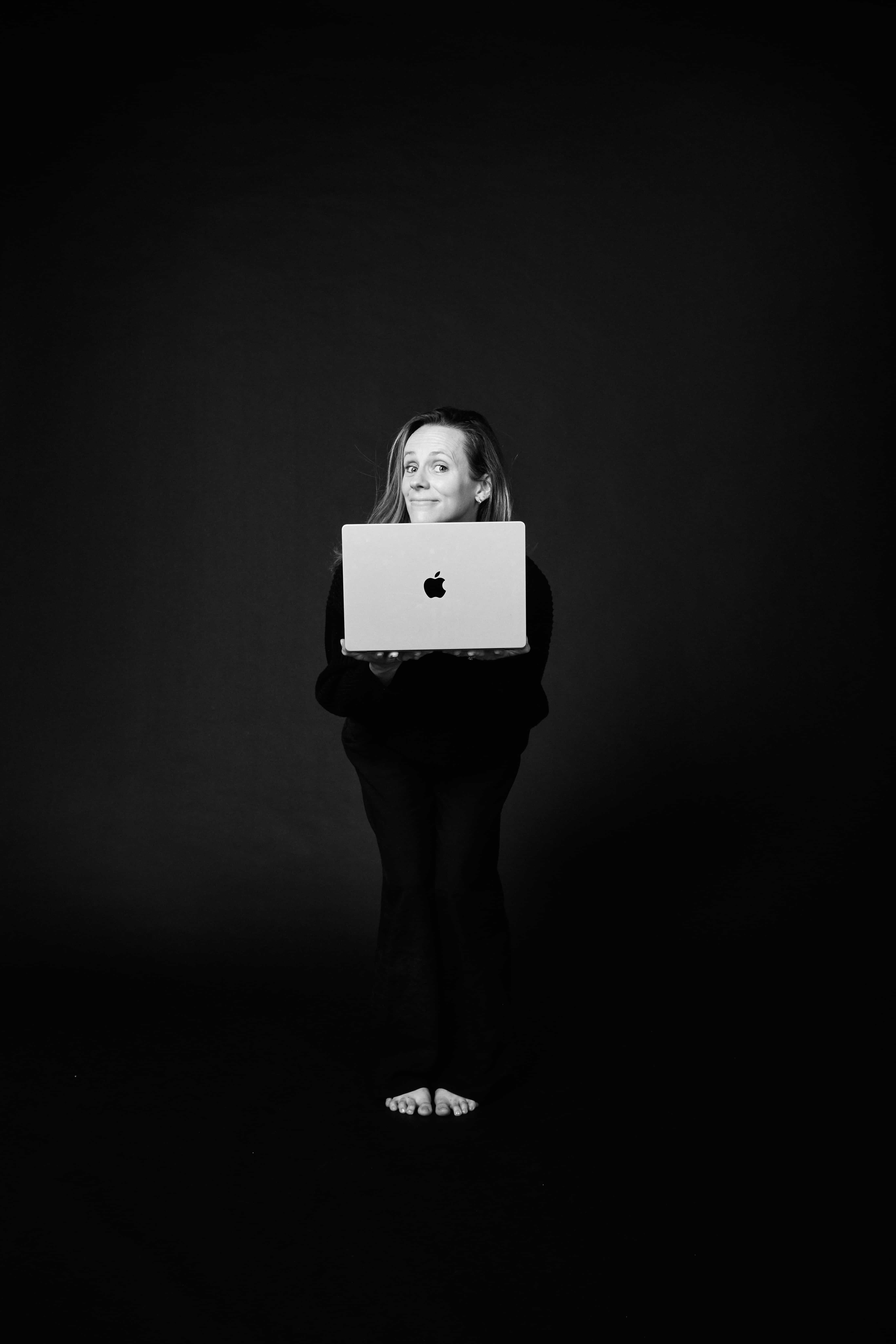 Chloe Cooper, relaxed, laptop in hand
